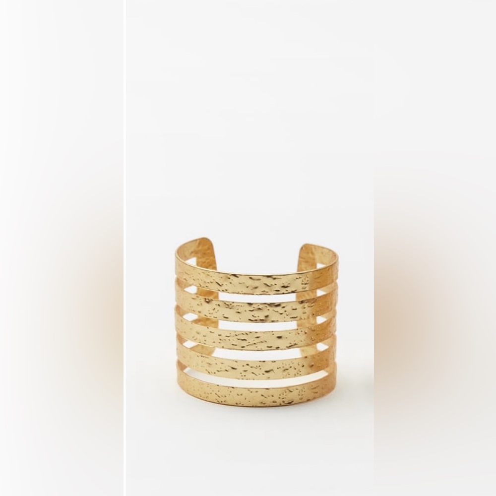 Gold chunky cuff bracelet. One size fits all. Molds to your wrist. NWOT